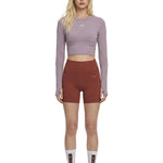 Aboito sportivo con shorts in rosso mattone Adidas by stella MC Cartney - donna 