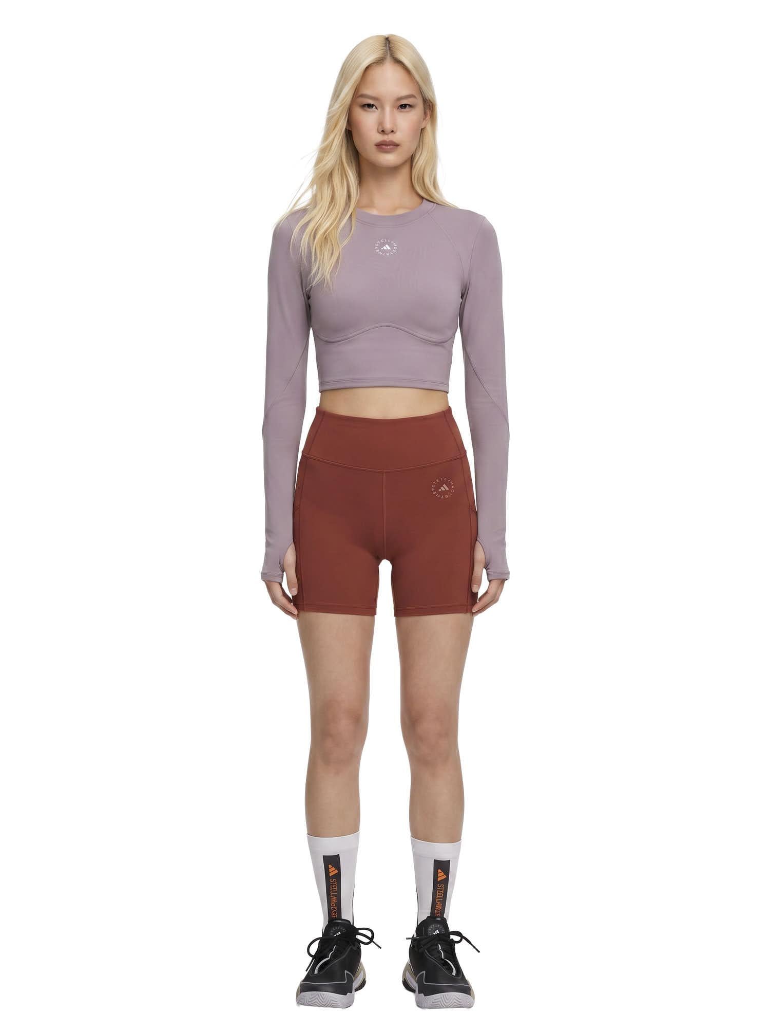 Aboito sportivo con shorts in rosso mattone Adidas by stella MC Cartney - donna 