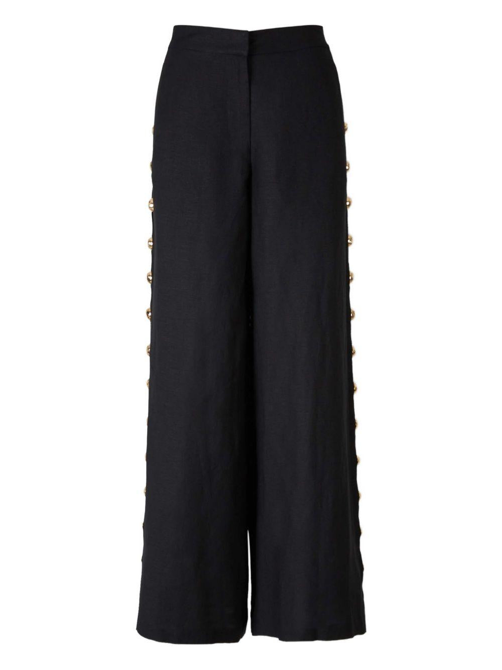 Pantaloni a palazzo Cayman con borchie in nero Simkhai - donna 