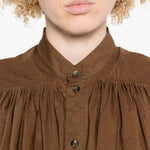 Blusa smanicata in marrone 