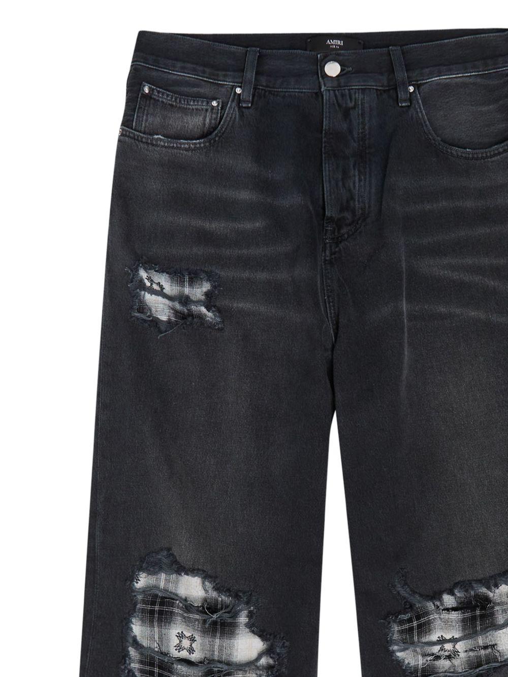 Jeans Funnel Repair con effetto vissuto in nero Amiri - uomo 