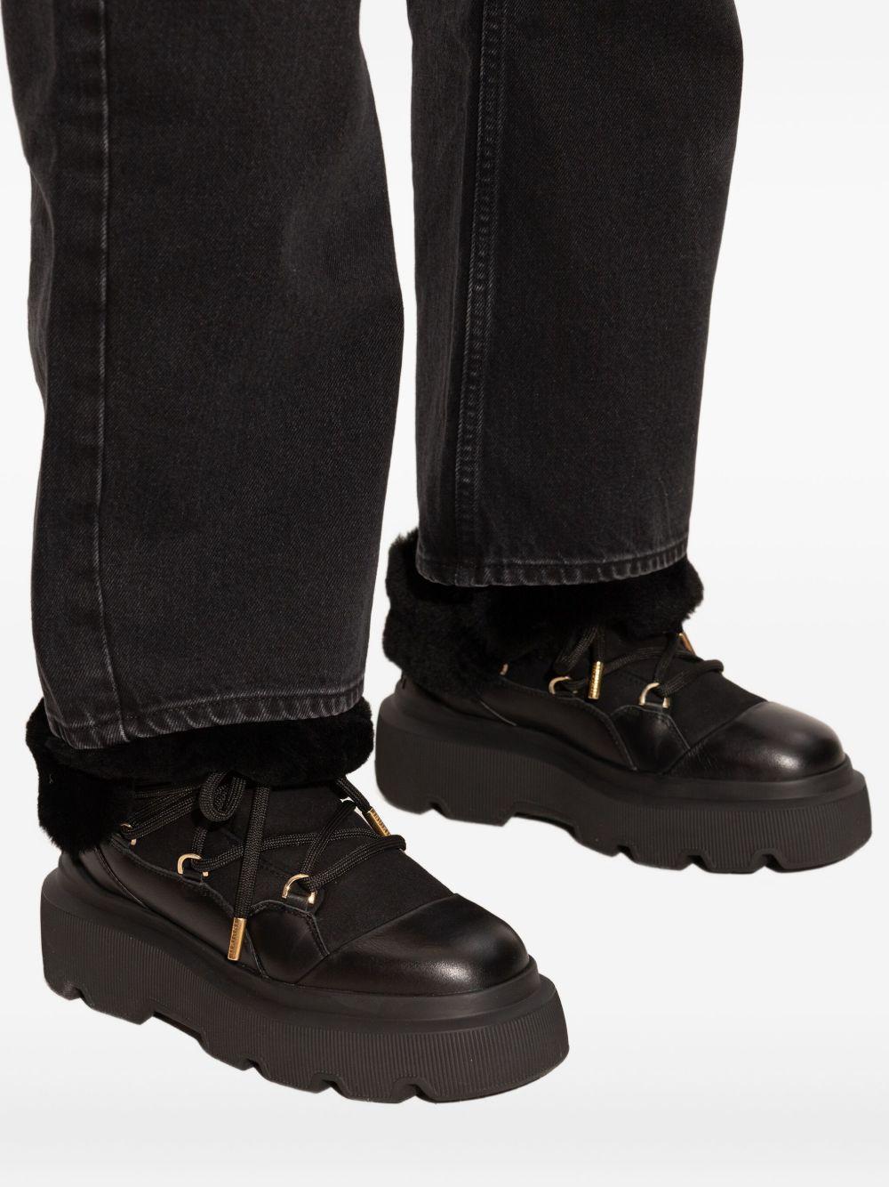 Stivaletti con plateau e lacci in nero Inuikii - donna 