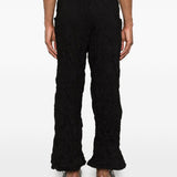 Pantaloni a gamba ampia in nero Gongdid design - uomo 