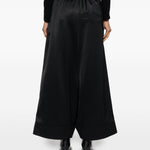 Pantaloni a gamba ampia con finitura satinata in nero Junya watanabe - donna 