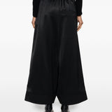 Pantaloni a gamba ampia con finitura satinata in nero Junya watanabe - donna 