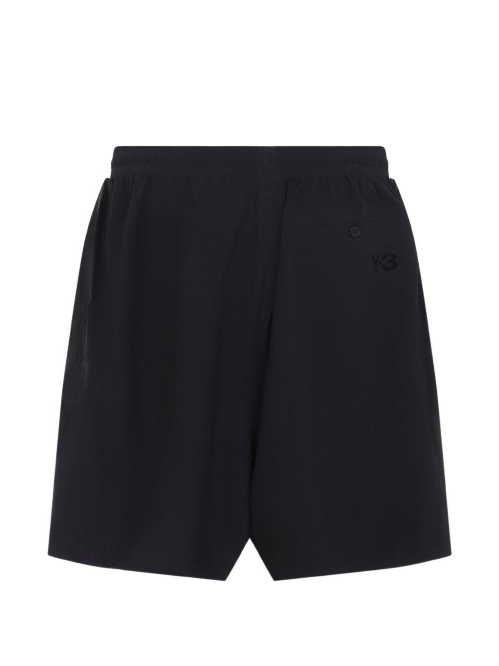 Pantaloni con tasche in nero Y-3 - uomo 