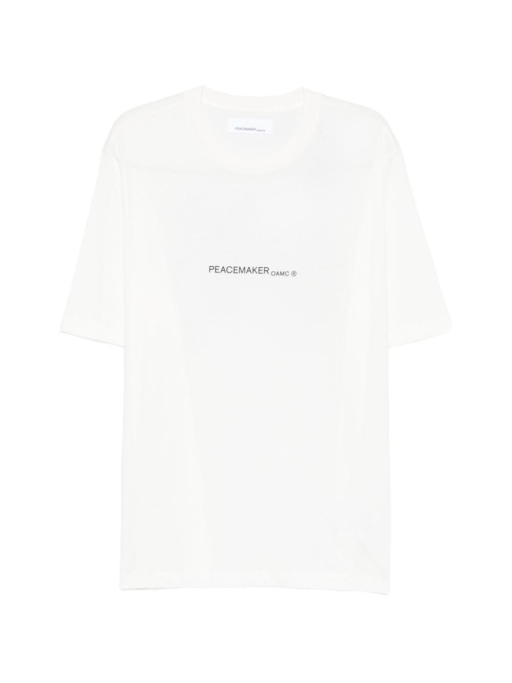 T-shirt con stampa grafica in bianco Oamc peacemaker - uomo 