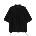 Polo con orlo elasticizzato in nero Comme des garcons homme - uomo 