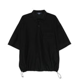 Polo con orlo elasticizzato in nero Comme des garcons homme - uomo 