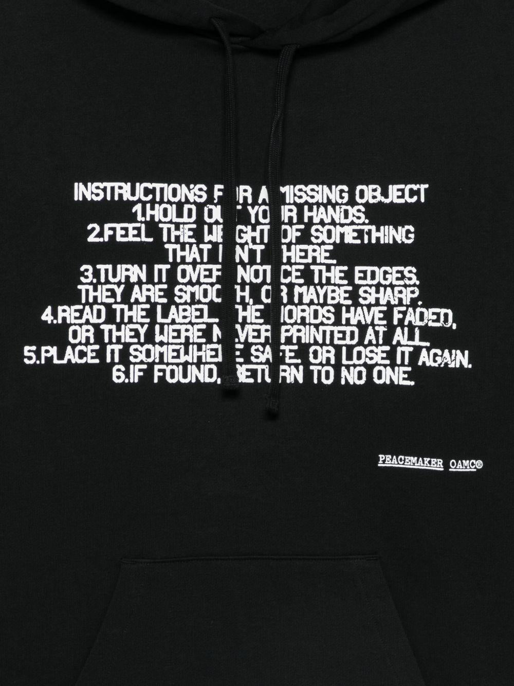 Felpa con stampa slogan in nero Oamc peacemaker - uomo 