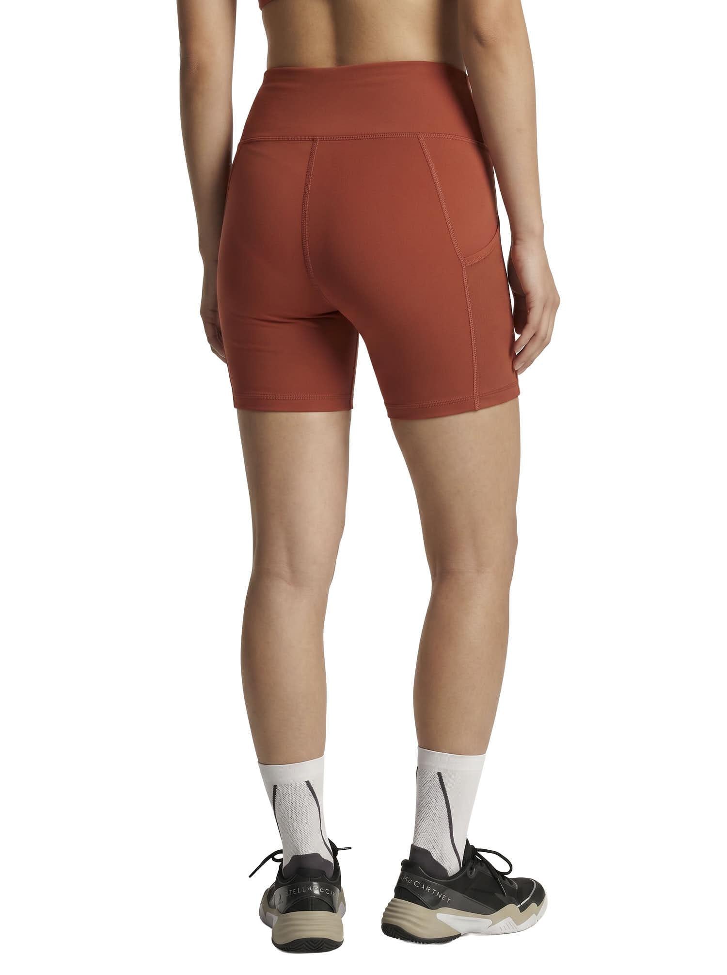 Aboito sportivo con shorts in rosso mattone Adidas by stella MC Cartney - donna 