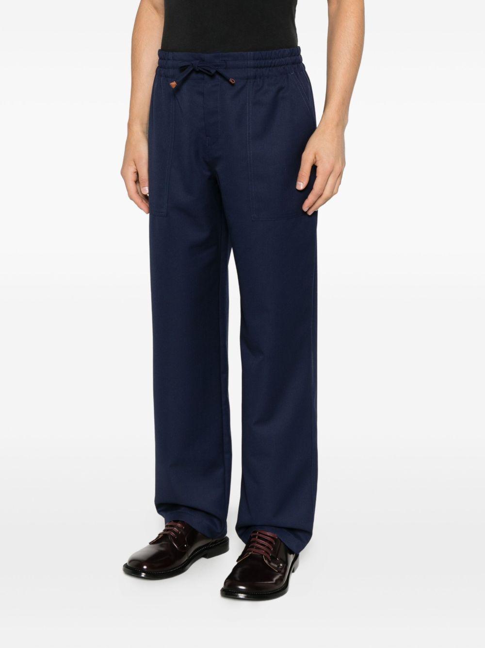 Pantaloni con tasche con coulisse in blu Drole de monsieur - uomo 