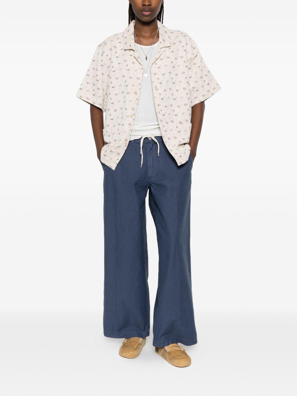 Pantaloni con passanti per cintura in blu Erl - unisex 