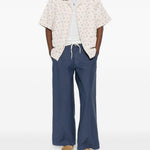 Pantaloni con passanti per cintura in blu Erl - unisex 
