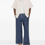 Pantaloni con passanti per cintura in blu Erl - unisex 