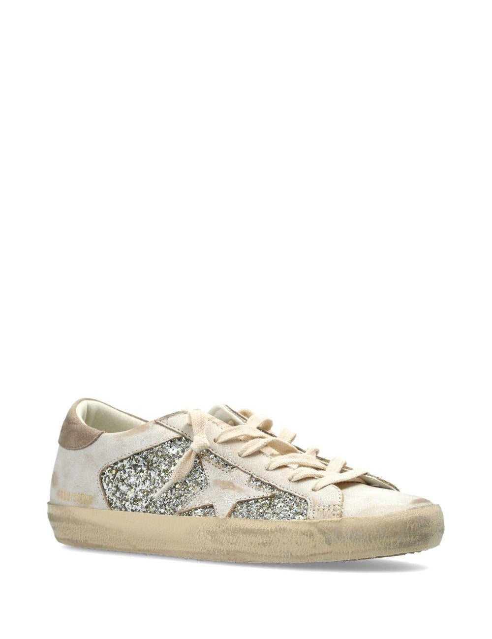 Sneakers super star glitter in avorio e argento golden goose - donna 