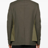 Giacca con design a pannelli in verde Comme des garcons homme plus - uomo 