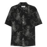Camicia a maniche corte con fantasia in nero Our legacy - uomo 