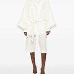 Cappotto con frange e cintura in bianco Batakovic - donna 