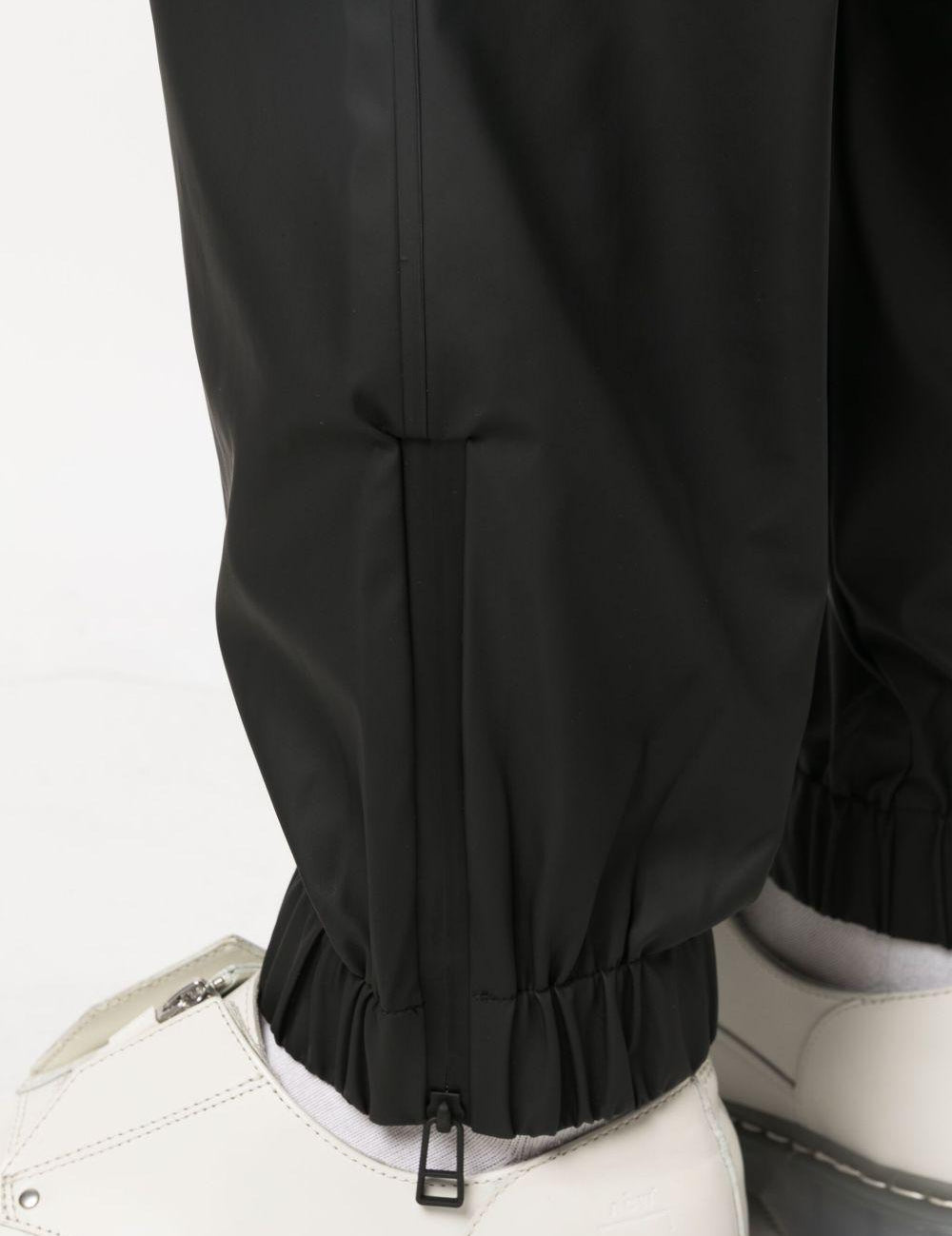 Pantaloni elasticizzati con coulisse in nero Rains - donna 