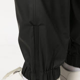 Pantaloni elasticizzati con coulisse in nero Rains - donna 