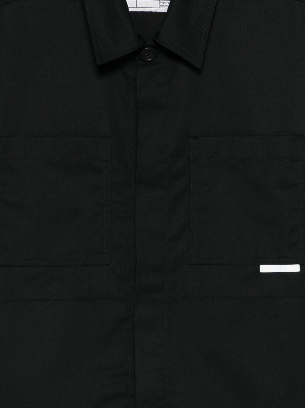 Giacca con tasche in nero Gr10k replicated - uomo 