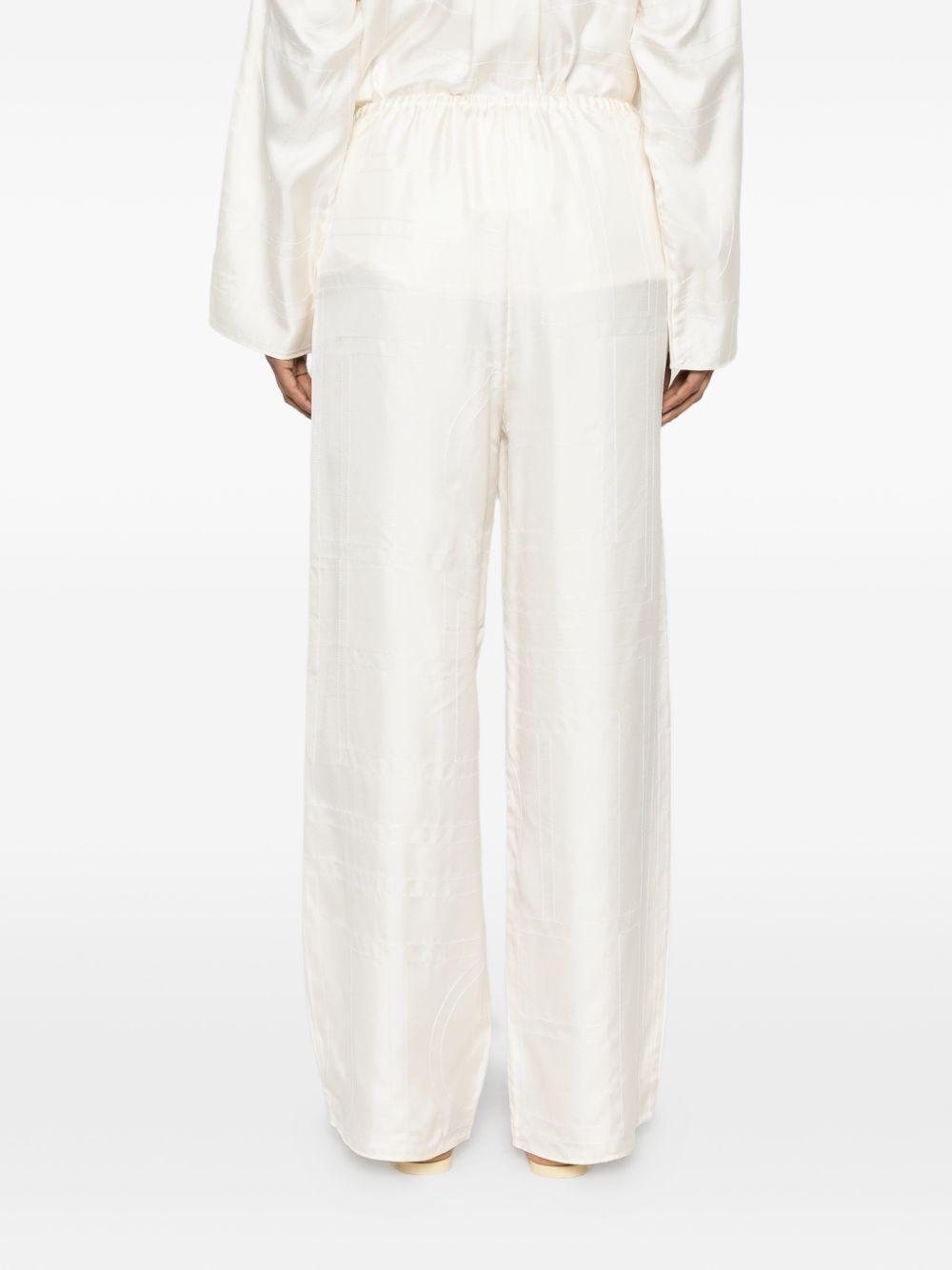 Pantaloni palazzo di seta in avorio Toteme - donna 