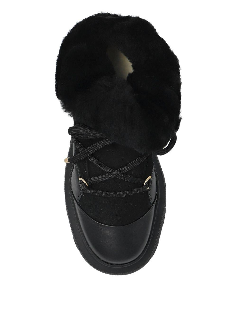 Stivaletti con plateau e lacci in nero Inuikii - donna 