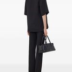 T-shirt con scollo a v ermo in nero Loulou de saison - donna 