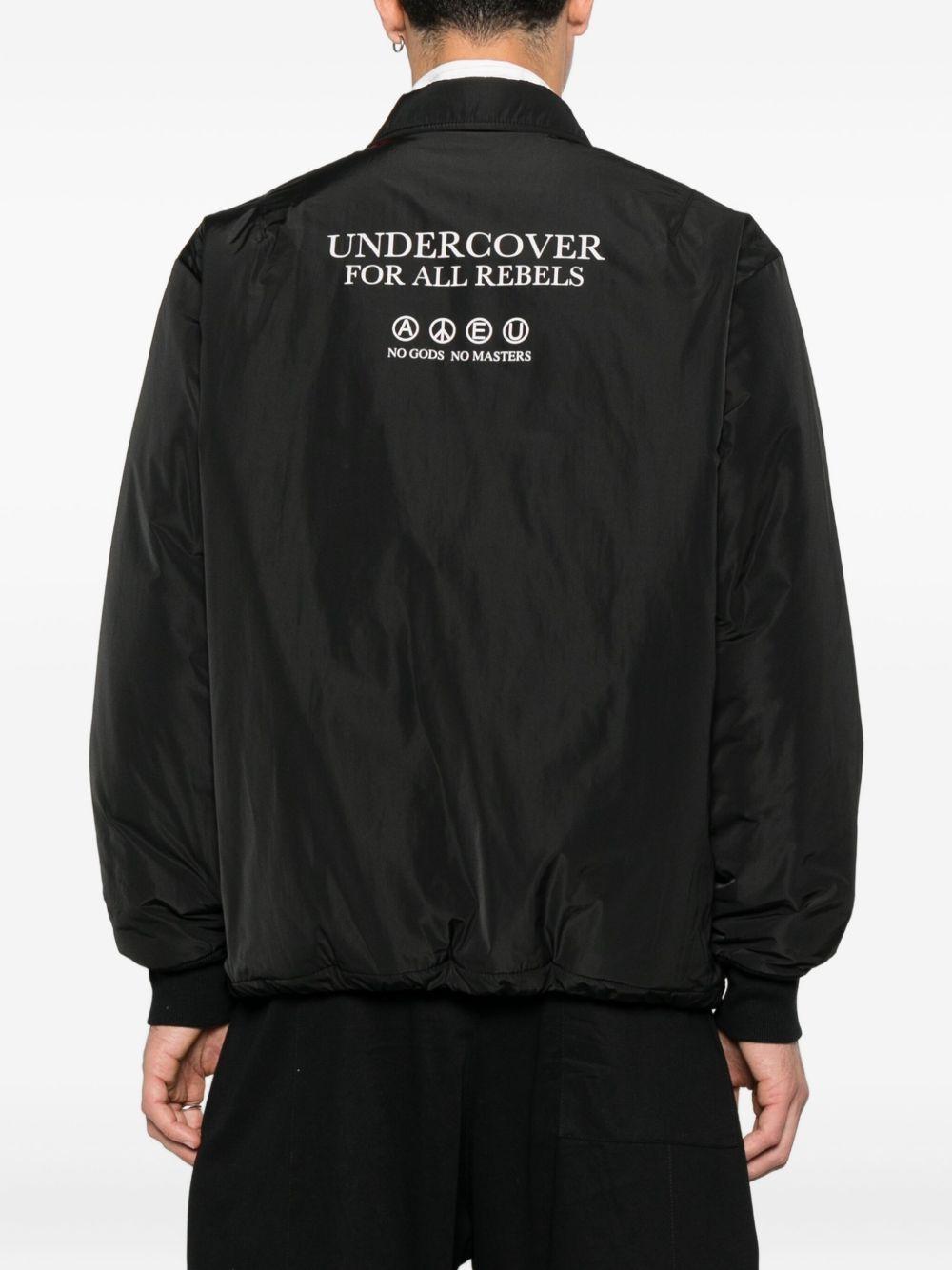 Giacca con abbottonatura automatica in nero Undercover - uomo 