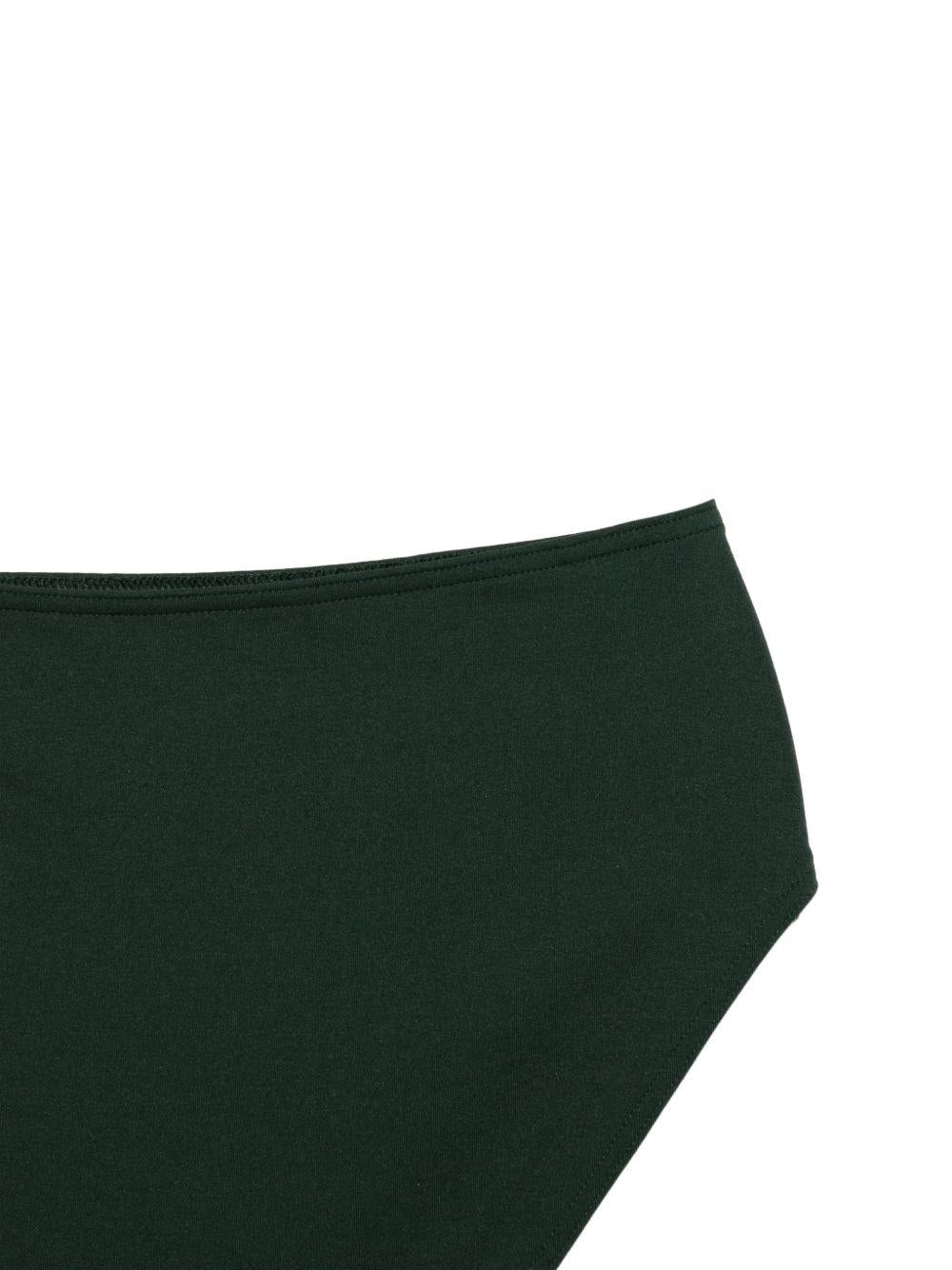 Costume monospalla color block in bianco e verde 