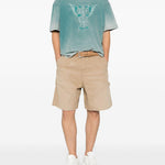 Short con design a pannelli in beige Represent - uomo 