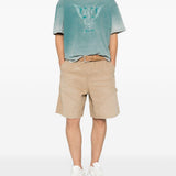 Short con design a pannelli in beige Represent - uomo 