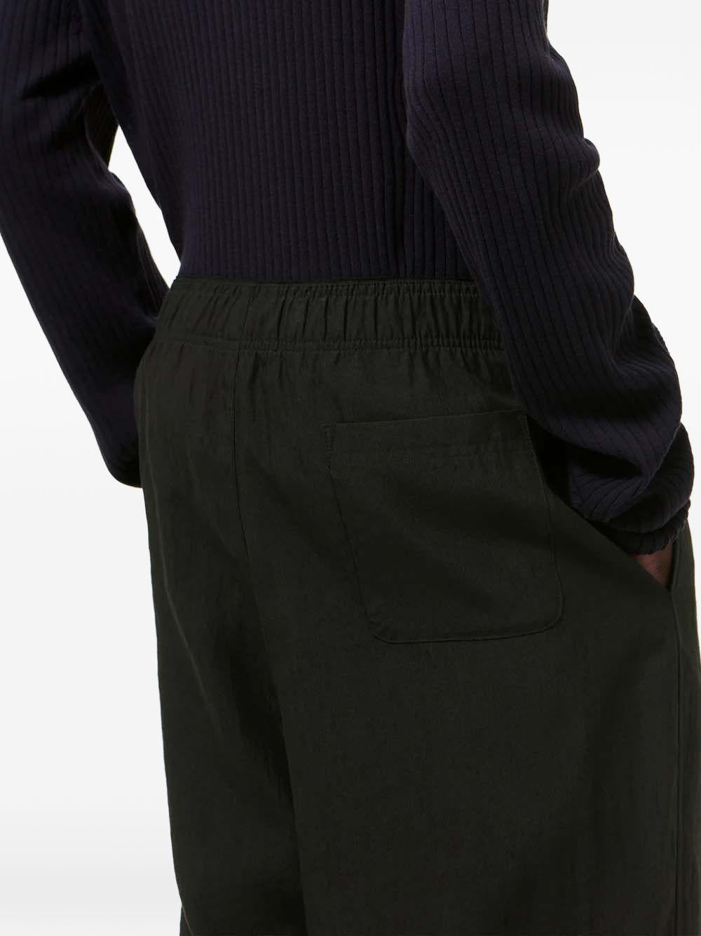 Pantaloni elasticizzati in verde Our legacy - uomo 