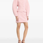 Gonna mini boucle in rosa 