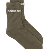 Calzini con logo in verde Comme des garcons homme plus - uomo<BR/><BR/> 