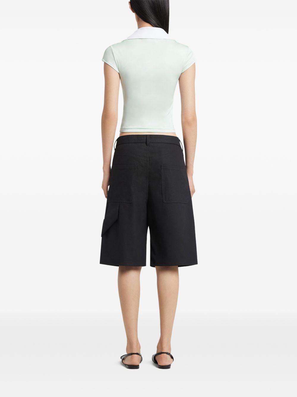 Polo con scollo a V in verde Courrèges - donna 
