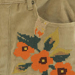 Pantaloni con ricamo floreale in beige Khoki - uomo 