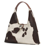 Borsa a spalla con stampa mucca Trapeze in bianco e marrone 