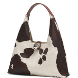 Borsa a spalla con stampa mucca Trapeze in bianco e marrone 