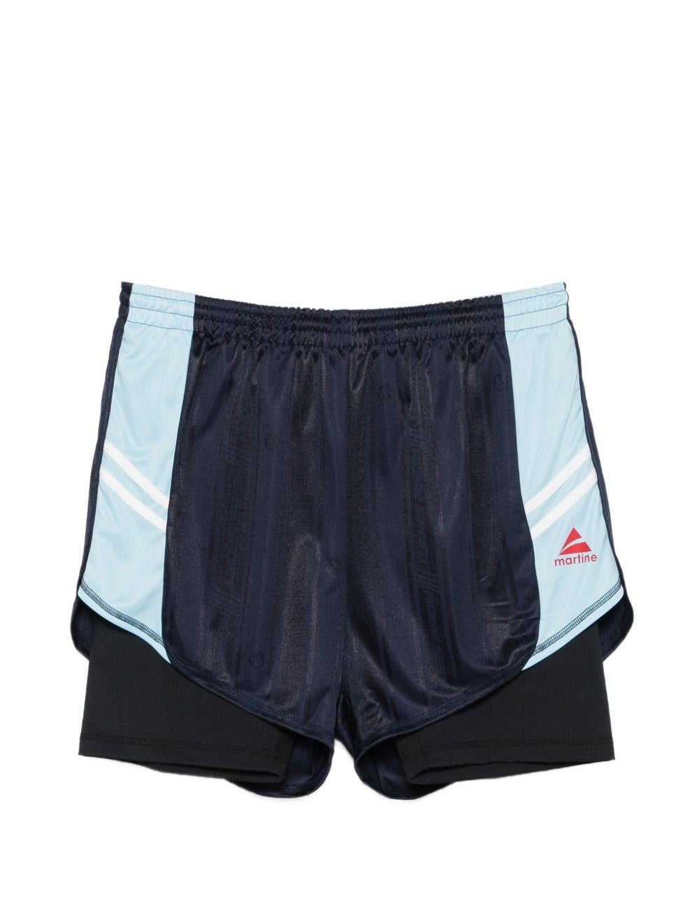 Pantaloncini con dettagli a righe in blu Martine rose - unisex 