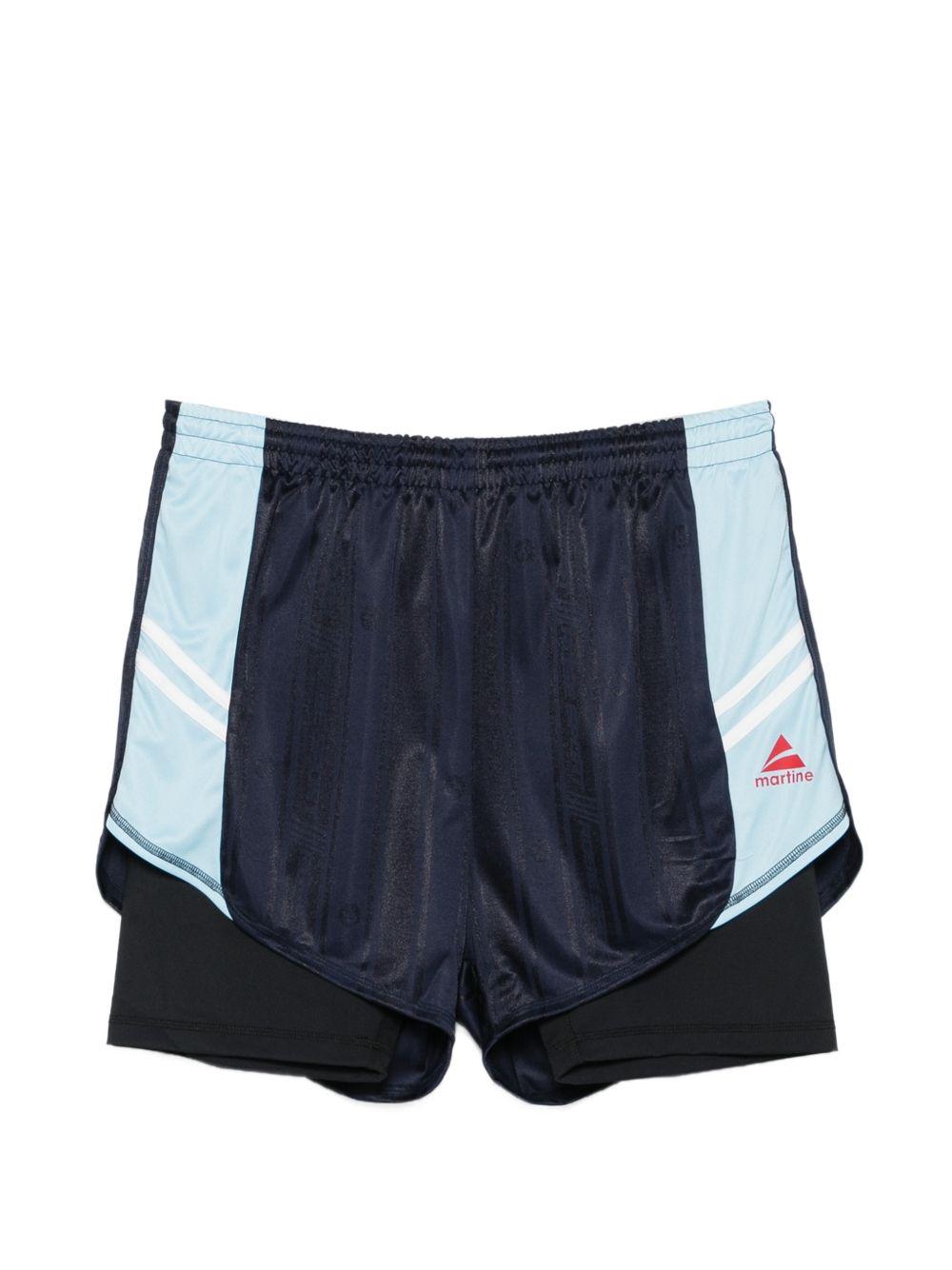 Pantaloncini con dettagli a righe in blu Martine rose - unisex 