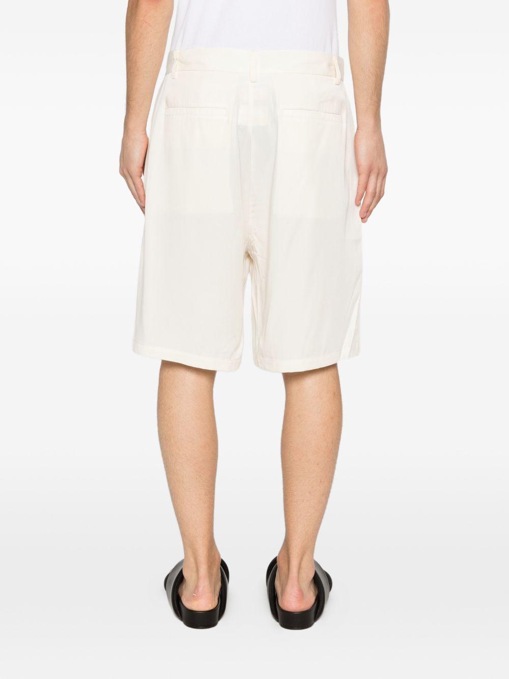 Pantaloncini con stampa grafica in bianco Kidsuper - uomo 