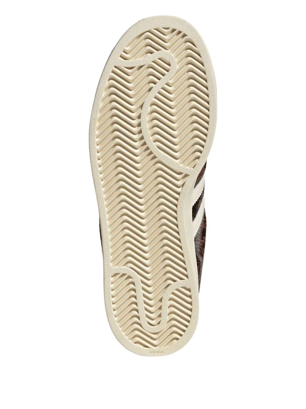 Sneakers superstar stampa animalier in marrone 