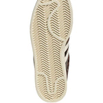 Sneakers superstar stampa animalier in marrone 