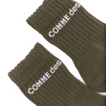Calzini con logo in verde Comme des garcons homme plus - uomo<BR/><BR/> 