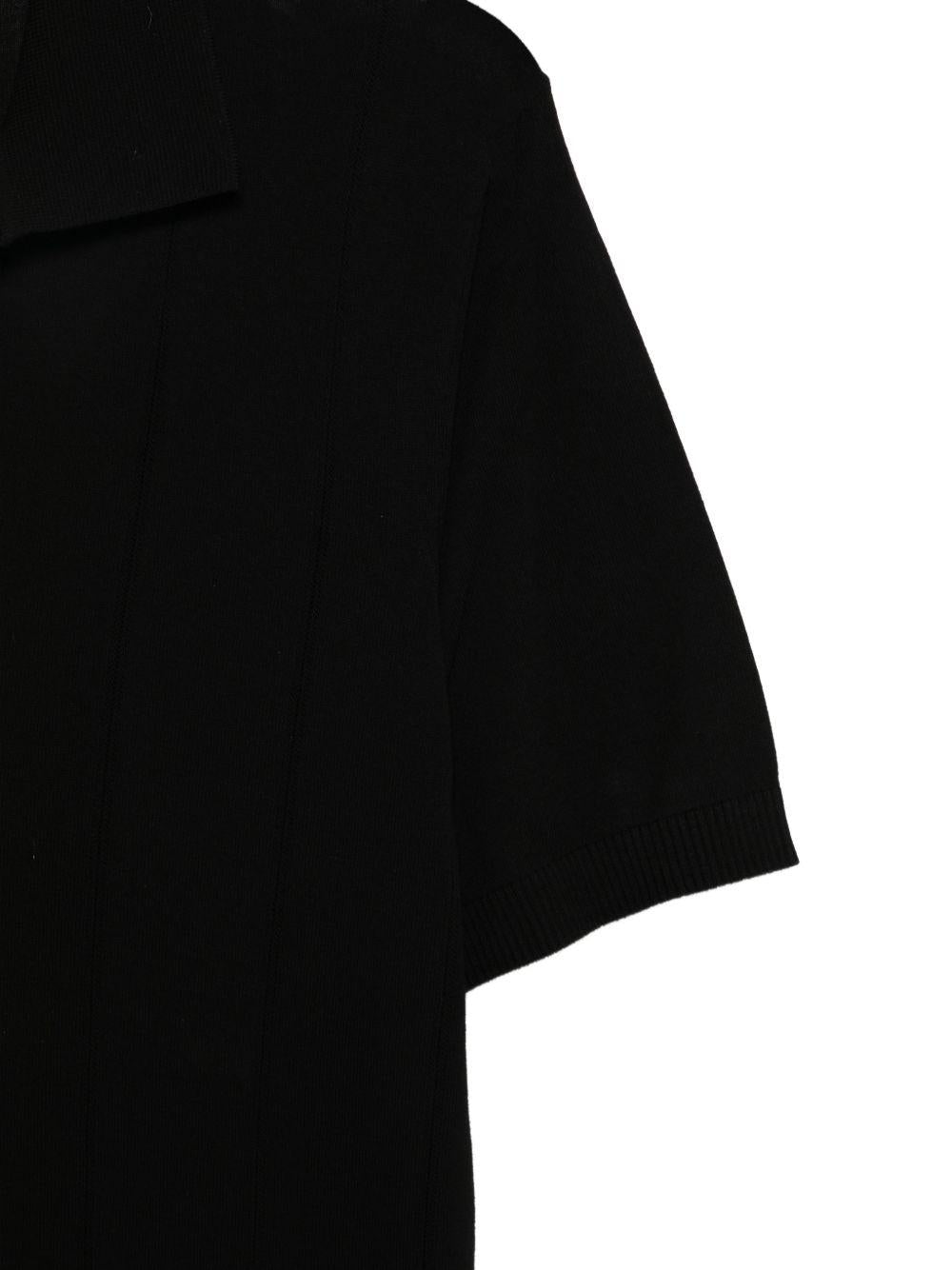 T-shirt a coste con collo polo in nero Kangra - uomo 