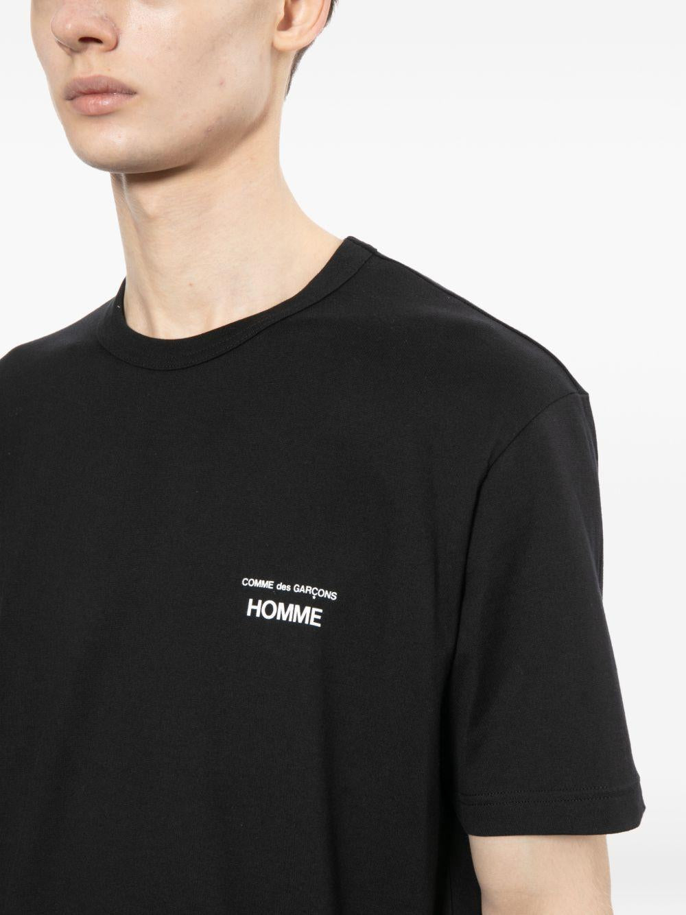 T-shirt con logo in nero Comme des garcons homme - uomo 