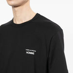 T-shirt con logo in nero Comme des garcons homme - uomo 