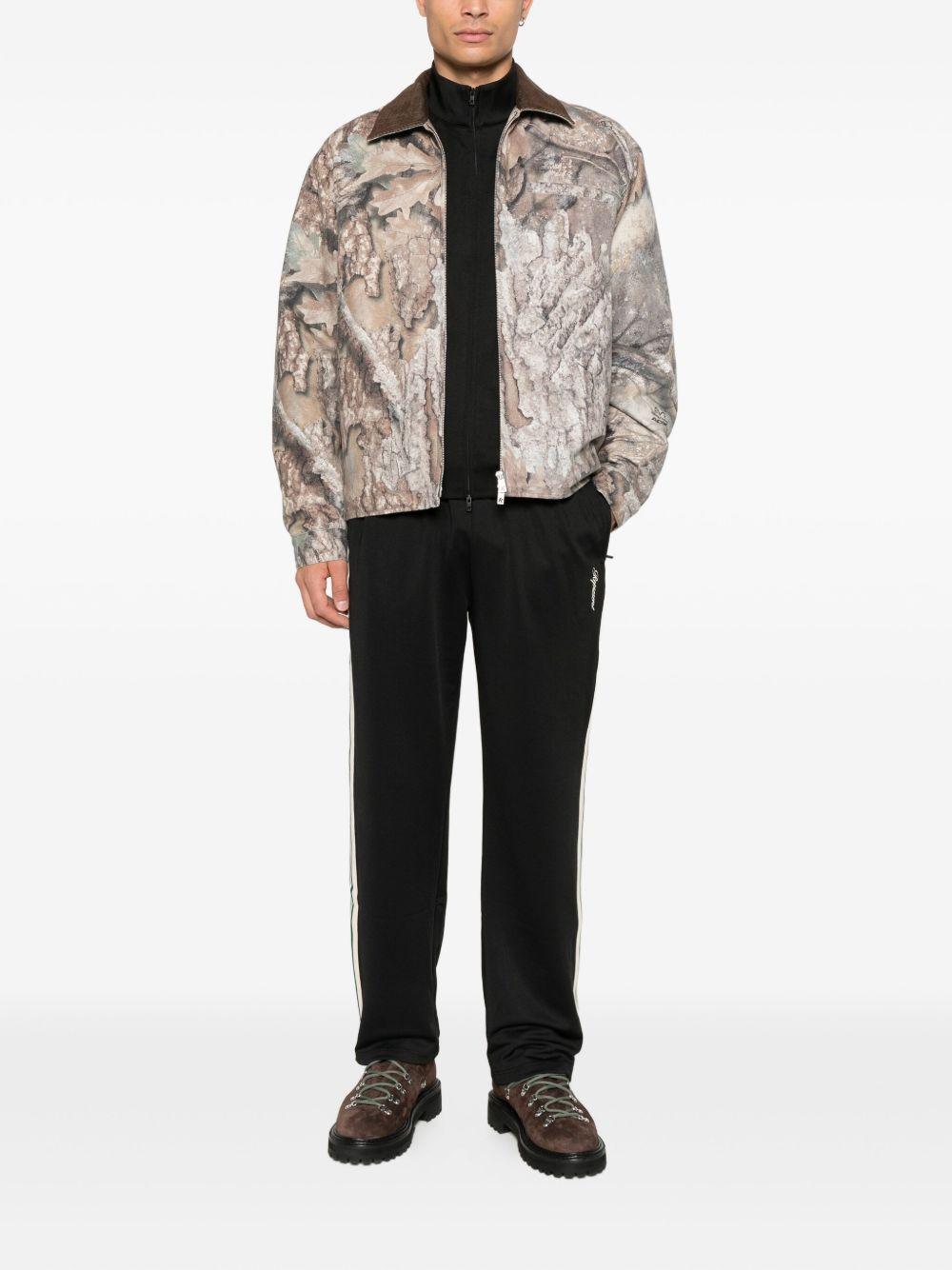 Giacca con stampa camouflage in beige e marrone Represent - uomo 